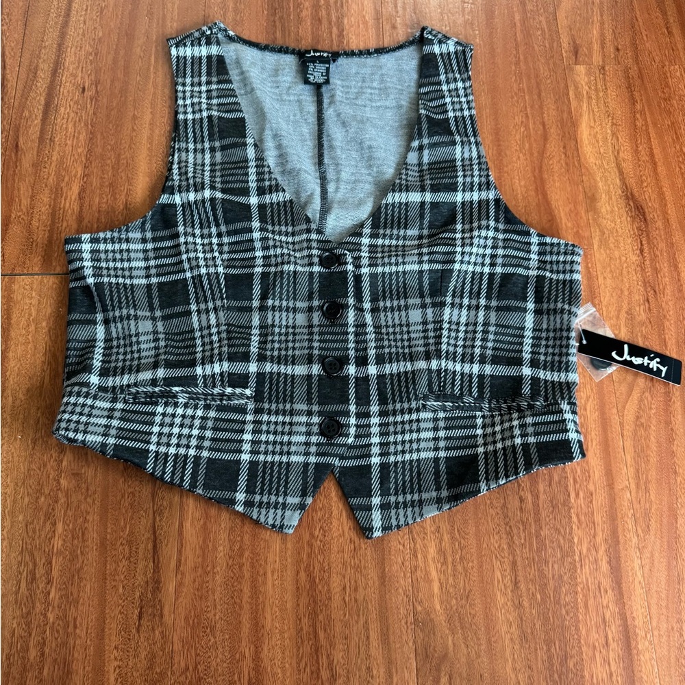Vest 
New with tags